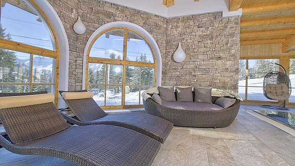 Stone veneer in the wellness and restaurant in Alpine hotel